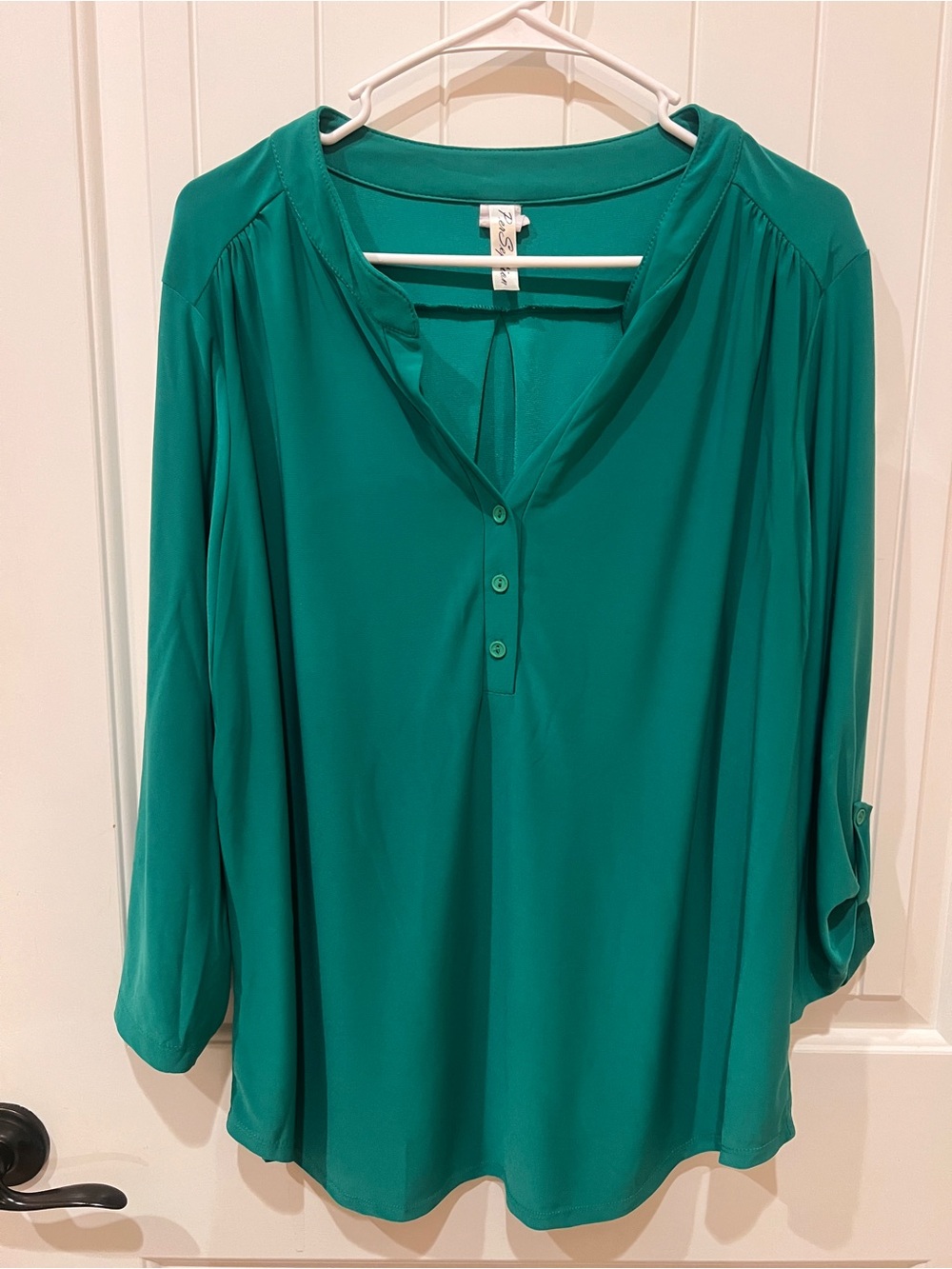 Women’s teal/green, long sleeve roll-tab blouse